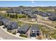 Stunning aerial view of new construction homes in a vibrant community with mountain views and nearby playground at 328 Simmental Loop, Castle Rock, CO 80104