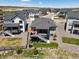 Expansive backyard featuring a deck, patio, and fenced-in yard, perfect for outdoor entertaining at 328 Simmental Loop, Castle Rock, CO 80104
