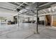 Spacious unfinished basement with concrete floors, exposed ceiling and support beams; great for storage or customization at 328 Simmental Loop, Castle Rock, CO 80104