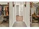 Walk-through closet connecting to the main bathroom, with well-organized storage for shoes, clothing, and accessories at 328 Simmental Loop, Castle Rock, CO 80104