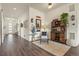 Stylish entryway with wood floors, decor accents, and an inviting bar area at 328 Simmental Loop, Castle Rock, CO 80104