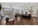 Open-concept living space combining the kitchen, dining, and living areas, perfect for modern living at 328 Simmental Loop, Castle Rock, CO 80104