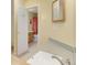 Bathroom features a single vanity with a view into another full bathroom with a shower at 5190 Buckingham Rd, Boulder, CO 80301