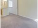 This comfortable carpeted bedroom is painted in a neutral tone at 5190 Buckingham Rd, Boulder, CO 80301