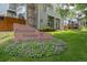 Entrance to Fountain Greens II with lush landscaping and community signage at 5190 Buckingham Rd, Boulder, CO 80301