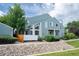 This inviting townhome features a side patio, well-maintained landscaping, and a serene neighborhood at 5190 Buckingham Rd, Boulder, CO 80301