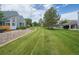 Expansive green lawn and landscaping showcasing the well-maintained grounds of this beautiful apartment complex at 5190 Buckingham Rd, Boulder, CO 80301