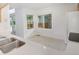 Eat-in kitchen space is full of natural light from windows and features quartz countertops and stainless sink at 5190 Buckingham Rd, Boulder, CO 80301