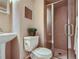 Bathroom featuring a glass enclosed shower and pedestal sink at 3540 E 5Th Ave, Denver, CO 80206