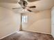 Bedroom featuring neutral paint, carpet, ceiling fan, and natural light at 3540 E 5Th Ave, Denver, CO 80206