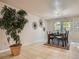 Inviting dining area with decorative wall art, a dining table set for four, and tile flooring at 3540 E 5Th Ave, Denver, CO 80206