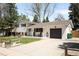 Charming split-level home boasting an attached garage and a well-maintained front lawn at 2213 E Panama Dr, Centennial, CO 80121