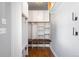Mud room with storage, built-in bench, hooks, shelves, and room for outdoor gear at 2213 E Panama Dr, Centennial, CO 80121