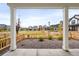 Inviting view from covered porch overlooking a park-like setting in a Gathering-friendly neighborhood at 129 Mesa Way, Superior, CO 80027