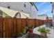 Fenced backyard featuring a patio area, perfect for outdoor entertaining at 1273 S Dallas Ct, Denver, CO 80247