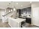 Stylish kitchen with stainless steel appliances and a functional center island at 1273 S Dallas Ct, Denver, CO 80247