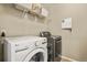 Convenient laundry room with modern washer and dryer at 1273 S Dallas Ct, Denver, CO 80247