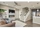 Cozy living room with fireplace, contemporary furniture, and lots of natural light at 1273 S Dallas Ct, Denver, CO 80247