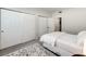 Bright bedroom featuring plush carpet and generous closet space at 5439 S Dover St # 101, Littleton, CO 80123