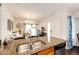 Open kitchen featuring granite countertops that connect to the living area at 5439 S Dover St # 101, Littleton, CO 80123