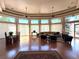 Spacious lounge area with large windows, comfortable seating, and dining table at 5439 S Dover St # 101, Littleton, CO 80123