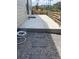 Covered concrete patio with gravel and stepping stones at 1178 Hargreaves Way, Erie, CO 80516