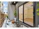 Cozy patio with outdoor seating and a view of a modern interior room creating an ideal space for relaxing at 1735 Lowell Blvd, Denver, CO 80204