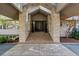 Inviting front entrance featuring a stone facade and covered entryway at 4766 S Fillmore Ct, Cherry Hills Village, CO 80113