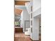 Hallway with exposed beams, staircase and views to other areas of the home at 4766 S Fillmore Ct, Cherry Hills Village, CO 80113