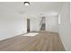 Finished basement with wood floors, neutral walls, and ample lighting at 1524 Twin Sisters Dr, Longmont, CO 80504
