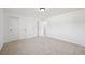 Bright bedroom with large closets and neutral carpet, offering a comfortable space at 1524 Twin Sisters Dr, Longmont, CO 80504