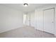 Bright bedroom with large closets and neutral carpet, offering a comfortable space at 1524 Twin Sisters Dr, Longmont, CO 80504