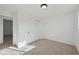Bright bedroom features neutral carpet and a spacious closet for ample storage at 1524 Twin Sisters Dr, Longmont, CO 80504