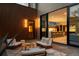 Stylish backyard patio featuring modern seating and a seamless transition to the indoor kitchen at 735 S Elizabeth St, Denver, CO 80209
