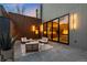 Backyard patio with modern outdoor furniture and seamless indoor-outdoor flow at 735 S Elizabeth St, Denver, CO 80209