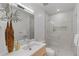 Elegant bathroom featuring modern fixtures, a glass enclosed shower and sleek countertop at 735 S Elizabeth St, Denver, CO 80209