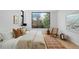 Bright bedroom with a view, natural light, and modern decor at 735 S Elizabeth St, Denver, CO 80209