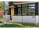 Modern home showcasing a well-kept front entrance with contemporary planters at 735 S Elizabeth St, Denver, CO 80209