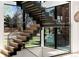 Modern staircase with glass partitions and an abundance of natural light at 735 S Elizabeth St, Denver, CO 80209