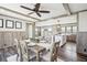 Cozy dining area with wood accents, open floor plan to kitchen, and modern decor at 62681 E Hampden Pl, Byers, CO 80103