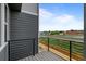 Balcony view with a view of railroad tracks and trees at 2736 W 68Th Ave, Denver, CO 80221
