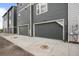 Attached garages with contemporary design, providing convenient parking for residents at 2736 W 68Th Ave, Denver, CO 80221