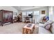 Open bonus room featuring vaulted ceilings, natural light, and flexible design for entertaining at 8255 S Vandriver Way, Aurora, CO 80016