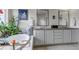 Luxurious main bathroom boasts double sinks, garden tub, and granite counters with modern fixtures at 8255 S Vandriver Way, Aurora, CO 80016