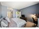 A serene bedroom features soft carpet, neutral colors, and ample space at 9622 W Coco Cir # 203, Littleton, CO 80128
