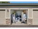 An open garage showing storage potential at 9622 W Coco Cir # 203, Littleton, CO 80128