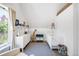 Cozy Bedroom space features an abundance of natural light, hardwood floors, and modern decor at 1718 W 33Rd Ave, Denver, CO 80211