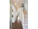 Well-lit entryway with hardwood floors, stairs to the upper level, and contemporary design at 1718 W 33Rd Ave, Denver, CO 80211
