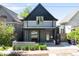 Charming two-story home with a front yard and a modern painted exterior at 1718 W 33Rd Ave, Denver, CO 80211