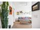 Cozy living room with exposed brick, stylish decor, and a comfortable sofa at 1718 W 33Rd Ave, Denver, CO 80211